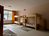 новый корпус тау жанашар